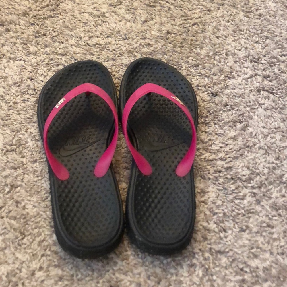 Nike flip flops.